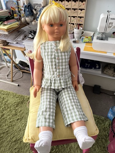 Large doll with extra - doll, clothes