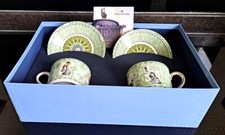 A SET OF WEDGWOOD ''MILLENIUM''  PATTERN COFFEE CUPS & SAUCERS, GREEN