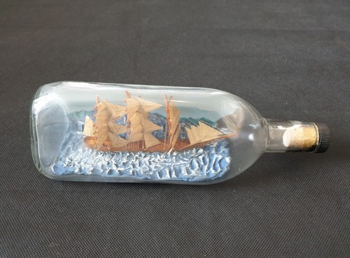 Vintage rigged ship - in, glass