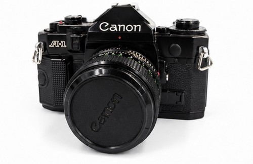 Canon black 35mm slr - canon,