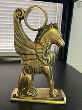 Ornate brass mythological