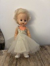 Vintage Dolls wearing bespoke clothing made by court dressmaker to Queen Mary