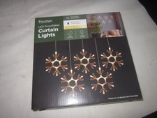 curtain lights by prestige led snow flakes 5 pieces of light on aa batteries