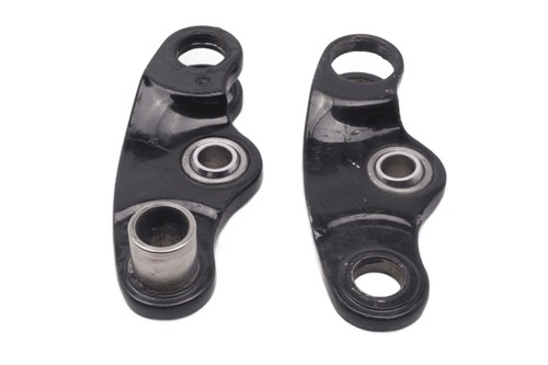 Shock absorber linkage tension
