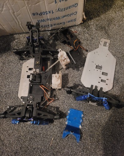 Two nitro car chassis with - two,