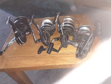 Vintage?? mixed  large pit sea reel  x4