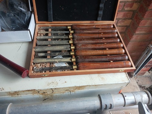 Wood lathe with lots - wood, of