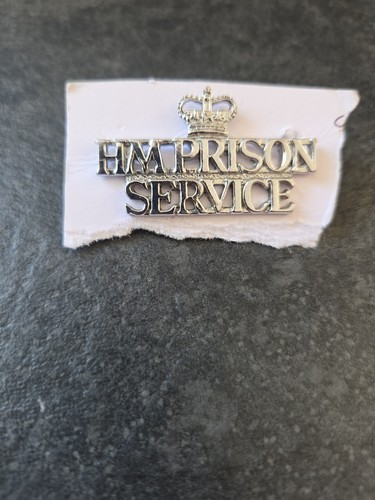 Prison shoulder badge - h,