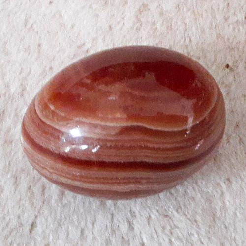 Polished banded agate pebble - polished,