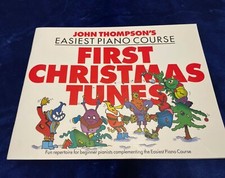 John Thompson's Piano Course-First Christmas Tunes. Piano learning book