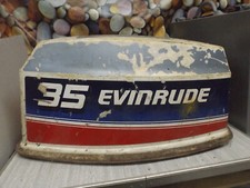 Evinrude outboard motor 2 cylinder Manual start. GRP hood (cover) 20-35 HP Used.