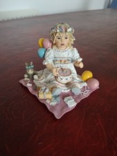 Birthday Girl figure a girl, cake, balloon and bunny rabbit.