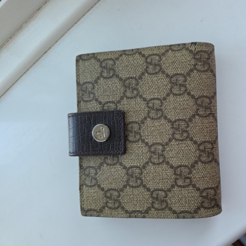 Gucci supreme bifold wallet - gg,