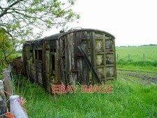 PHOTO  DISUSED RAILWAY CARRIAGE BY THE SIDE OF THE ROAD  BETWEEN MAESHAFN AND NE