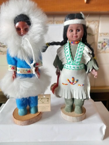 Two plastic costume dolls - two,