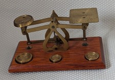 Brass weighing scales - weighing, on
