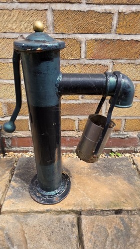Vintage cast iron hand - hand, water