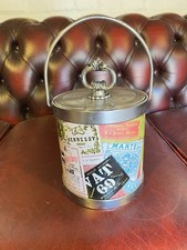 Mid-century vintage ice bucket featuring whisky, cognac and liquor labels