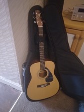 Yamaha FG 403-MS guitar (left