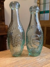 Pair of dated LEAMINGTON SPA "SKITTLE" Edwardian mineral water bottles
