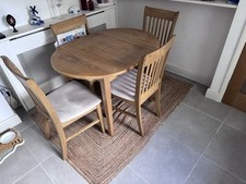 Extending Oval solid Oak Table,Chairs,Jute  Rug.  can be purchased separately 