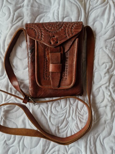 Hand tooled brown leather - hand,