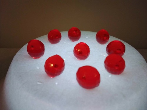 Red round faceted globes - round,