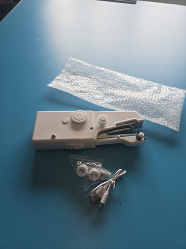 Handheld sewing machine - handheld,