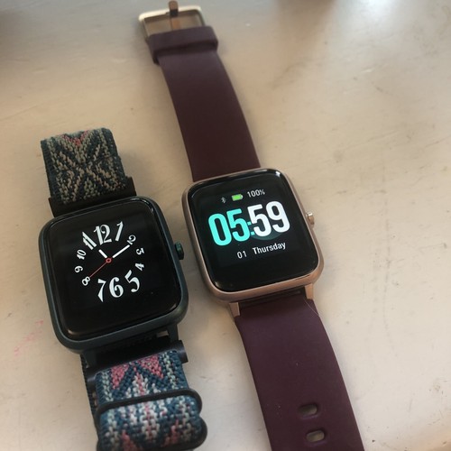 Two fitness trackers with - two,
