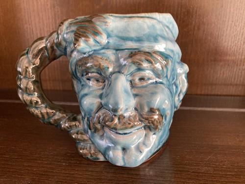 Guernsey pottery mug face - ,
