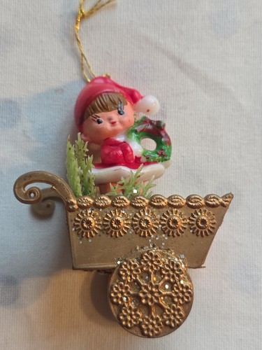 Vintage child a pram - a,