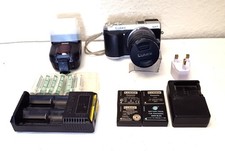 Panasonic LUMIX DMC-GX7 16MP Camera with 14-42mm Lens, and Metz Flash Gun