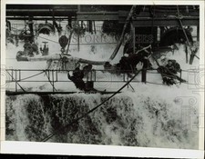 1945 Press Photo Water sweeps