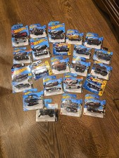 Collection X22 Hot Wheels Die-Cast Models, Batman Series, Mostly Batmobiles.