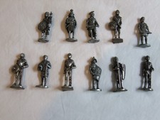 11 x Vintage Kinder Surprise 1980s metal toy soldiers.