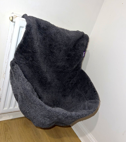 Grey plush radiator cat - radiator, bed