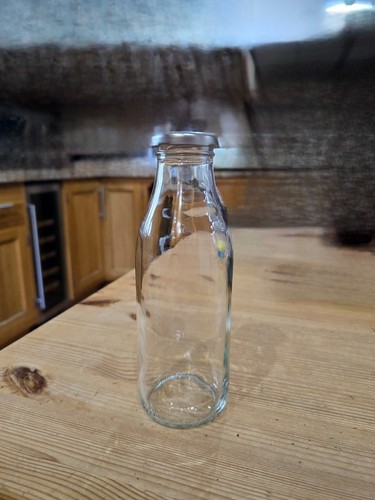 Half litre glass bottle - half, with