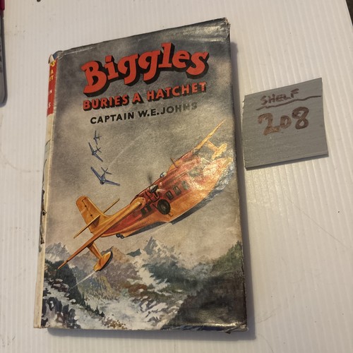 Biggles buries hatchet w e - hatchet:,