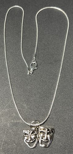 Silver tone comedy and - silver,