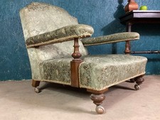 A FINE ANTIQUE VICTORIAN COUNTRY HOUSE LOW ARMCHAIR