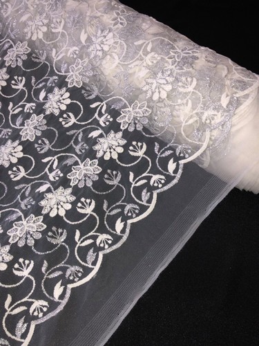 Meter sparkling ivory - 1,