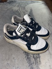 Puma CA Pro Classic Trainers in a white and club navy colorway