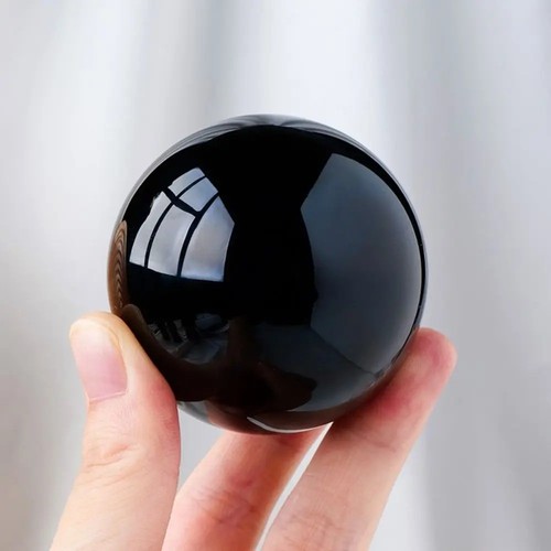 Natural black obsidian sphere - black,