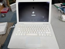 White 13" Macbook original box. Early 2008 Core 2 Duo 2.4ghz 2GB RAM 10.7 Lion