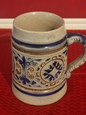 German Stoneware Mug Half Liter with Embosed Decoration and Moto Motif
