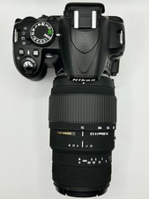 Nikon D3100 DSLR Camera + Sigma 70-300mm DG Macro Lens Kit – Free UK Post