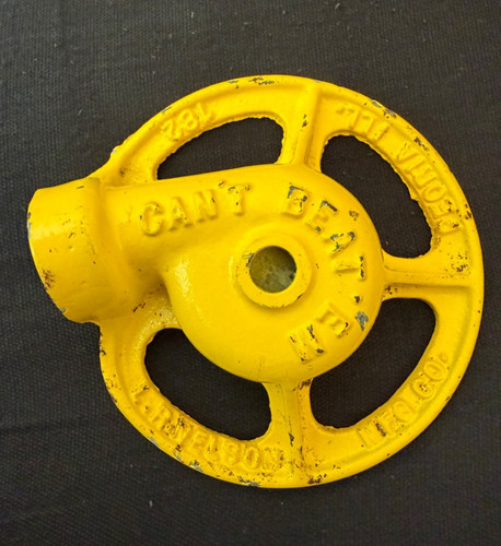 Vtg yellow cast - iron, sprinkler