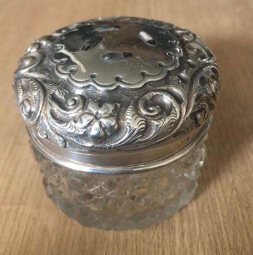 Cut glass jar with sterling - cut,
