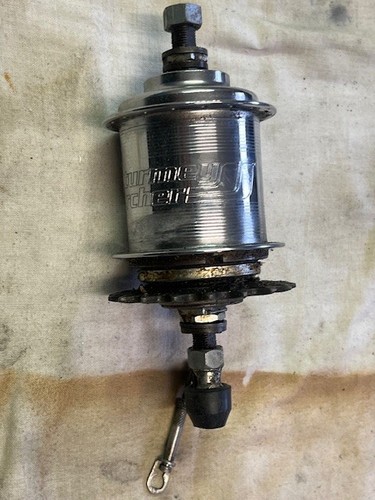 Rear wheel hub with gear - wheel,