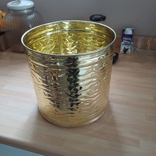 Brass effect waste paper